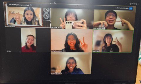 Jocelyn on a video call with friends, staying close across time zones