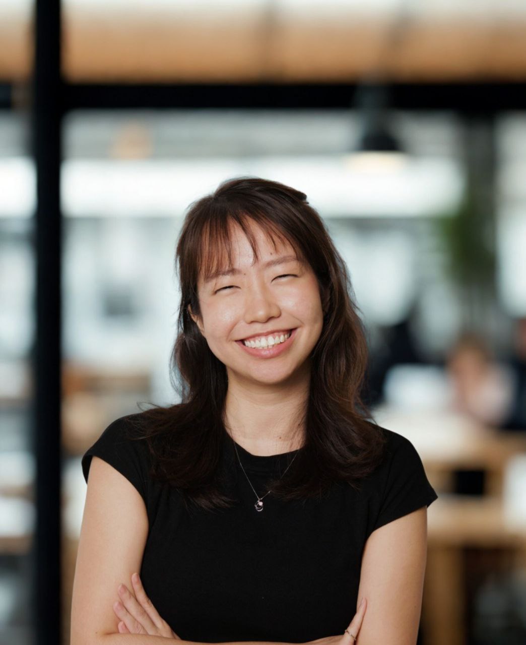 Jocelyn Lim hosting in a bright room